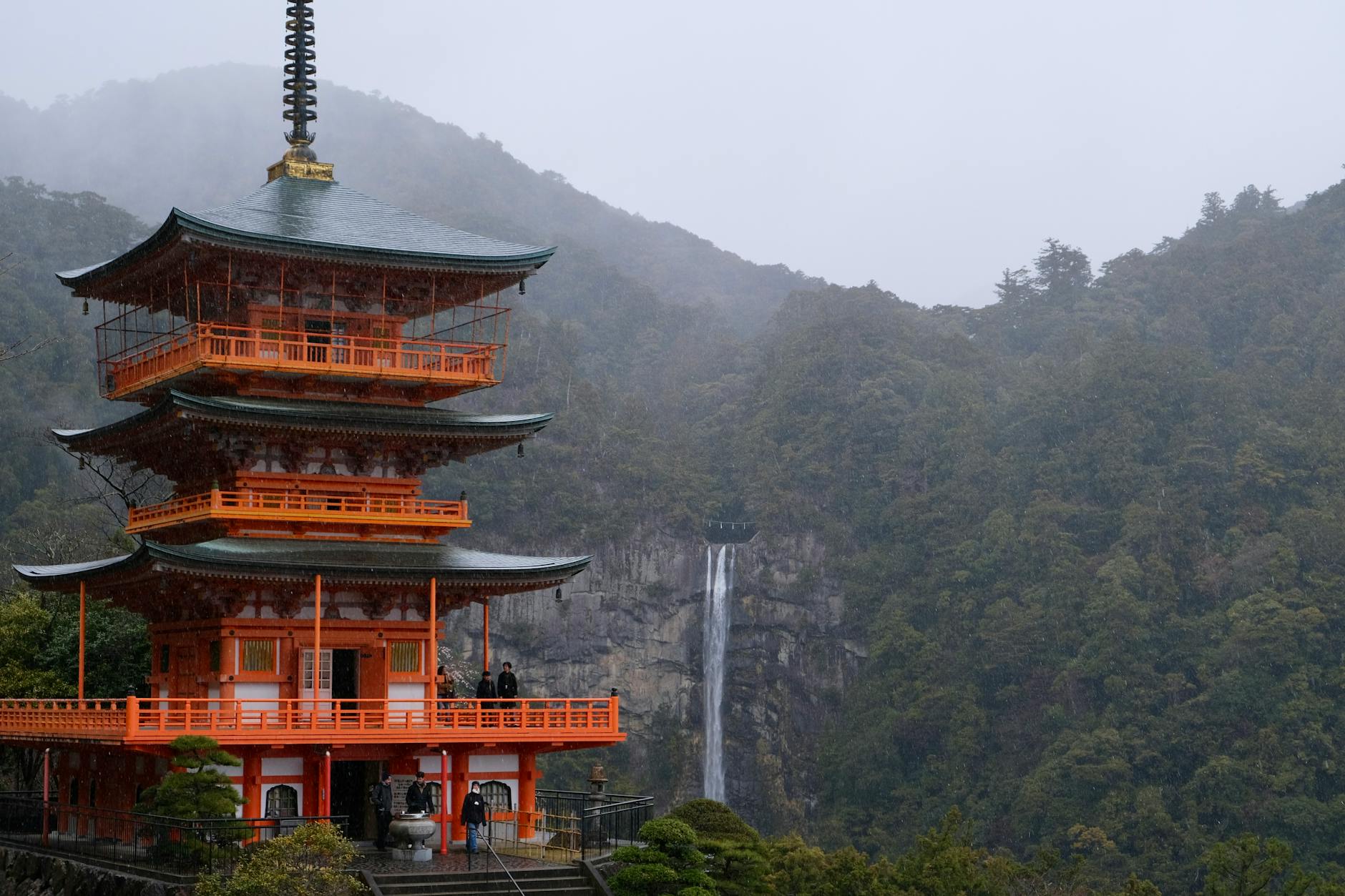 Seiganto-ji Temple near Nachi Waterfall in Japan's lush forest landscape, ideal for travel exploration.